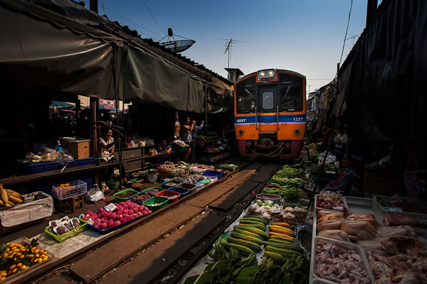 train through market thailand
